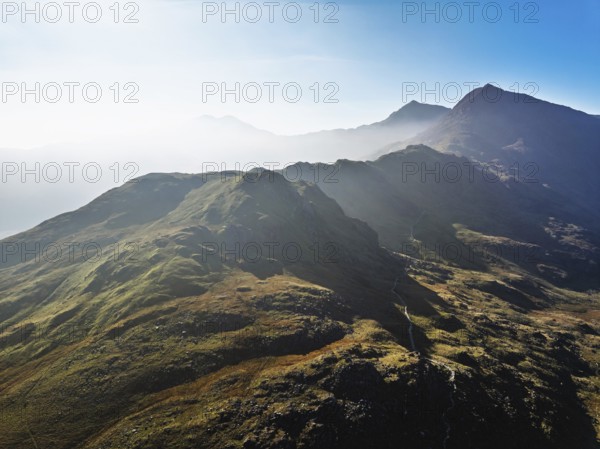 DefaultAutumn colours of Pen-y-Pass over Miner's Track, Start Point and road A4086 from a drone,