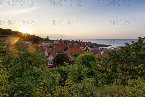 View of Gudhjem, view over the roofs of the Baltic Sea, sunset, sunbeams, Gudhjem, Bornholm, Baltic