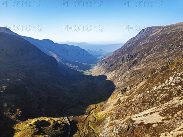 Autumn colours of Pen-y-Pass over Miner's Track, Start Point and road A4086 from a drone,