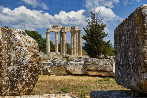 Ancient Greek ruins with columns under a blue sky with clouds, Nemea, Ancient Zeus Heightum,
