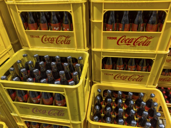 Bottles stacked in boxes drink soft drink without sugar Coca-Cola Coke Coca Cola Zero Sugar,