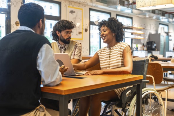Diverse colleagues collaborating around a modern coworking table, smiling and brainstorming with a