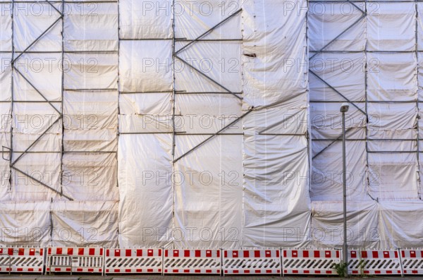 White construction plans cover the entire construction site of a building, Ziegelstraße, Berlin,
