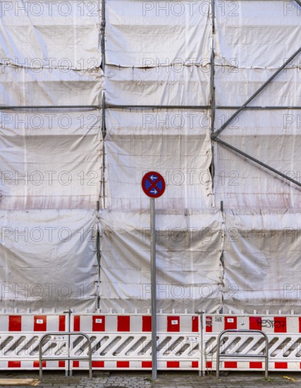 White construction plans cover the entire construction site of a building, Ziegelstraße, Berlin,