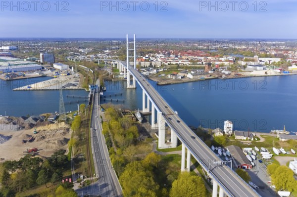 Aerial view over New Rügen Bridge and the old drawbridge at Stralsund along the Strelasund, sound
