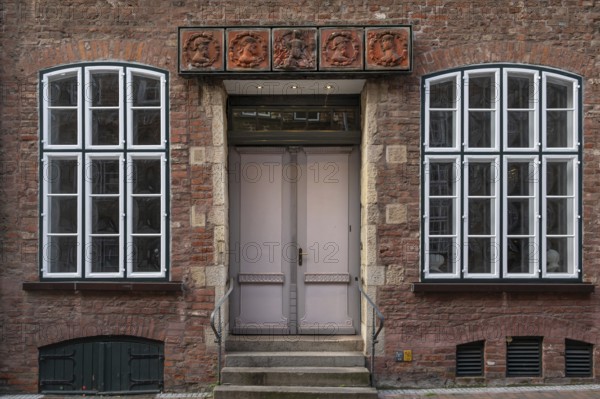 Terracotta decoration above the entrance to the Schabbelhaus, a Renaissance building built in 1558,