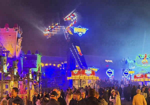 Many people at the All Saints Fair at night, the biggest old town fair in Europe, Soest, North