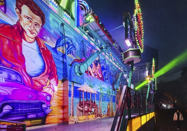 Colourfully illuminated All Saints Fair at night, the largest old town fair in Europe, Soest, North