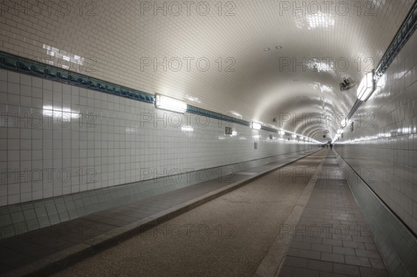 Interior view, pedestrians crossing tunnel, tube, historic old Elbe Tunnel, Free and Hanseatic City