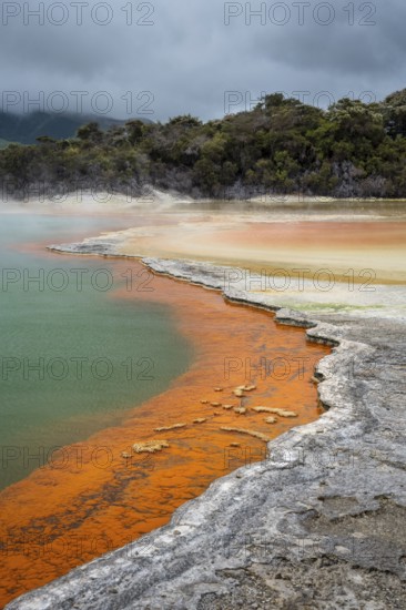 The champagne pool in the Waiotapu geothermal area (Wai-O-Tapu) . orange and yellow. Waiotapu,