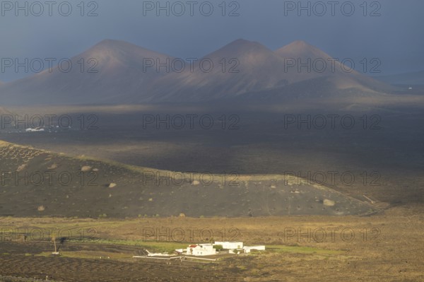 Finca in the La Geria wine-growing region, behind the Timanfaya National Par with the Fire