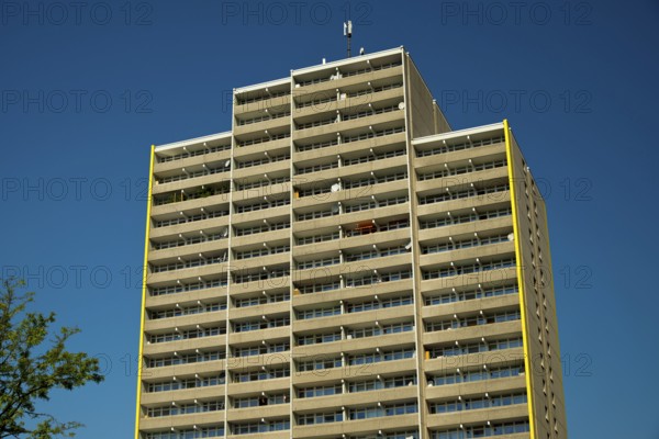 High-rise apartment building with balconies and satellite dishes, satellite town of Chorweiler in
