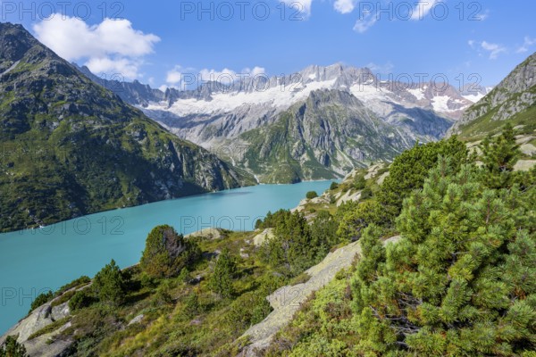Turquoise blue mountain lake Göscheneralpsee, picturesque mountain landscape with dammastock and