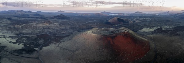 Caldera Colorada volcano, picturesque volcanic landscape with volcanic craters at sunrise, Los