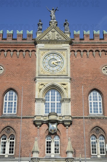 Facade of the town hall in Odense with the figures Power, Justice and Wisdom on top, Fyn, Funen