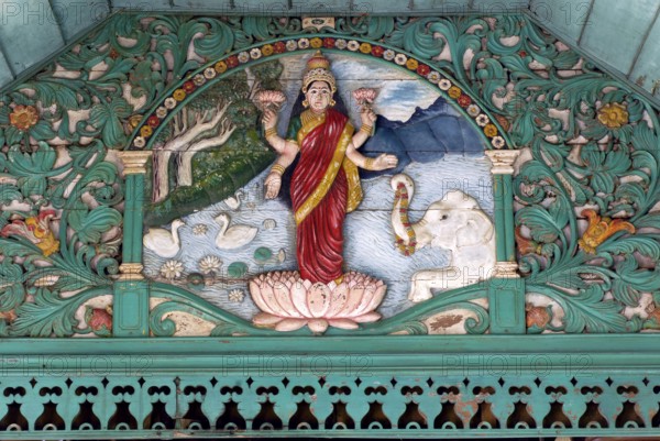 Painted wooden relief, Hindu goddess Lakshmi, goddess of luck, love, fertility, prosperity, health