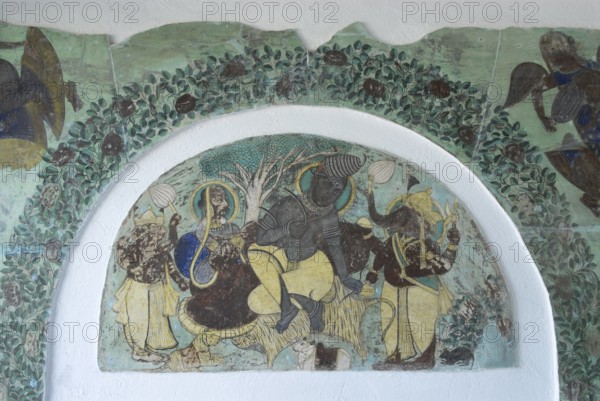 Ancient frescoes depicting Hindu gods Ganesha and Shiva, Devigarh Palace Hotel, near Udaipur,