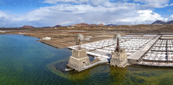 Salt mining plant, Salinas de Janubio with green Laguna de Janubio, near Yaiza, aerial view,