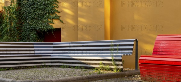 Wooden seating area at Kultkino Babylon on Rosa Luxemburg Platz, arthouse cinema opened in 1929,
