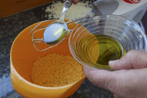 Southern German cuisine, preparing aioli, garlic cream, mayonnaise, oil and minced egg, men's