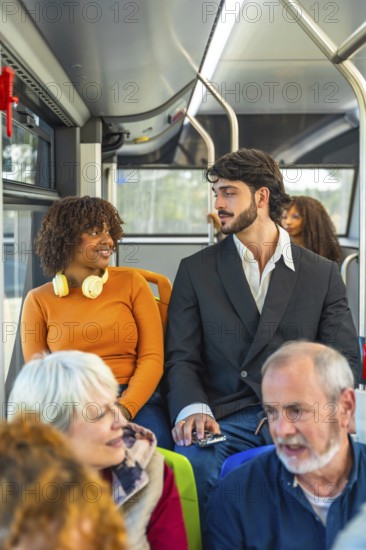 Diverse group of bus passengers traveling together, including a young african american woman