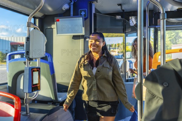 Woman smiling and walking inside a modern city bus, preparing for her daily commute, representing