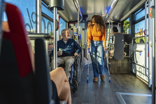 Senior man in a wheelchair and a woman using crutches traveling together on a modern, accessible