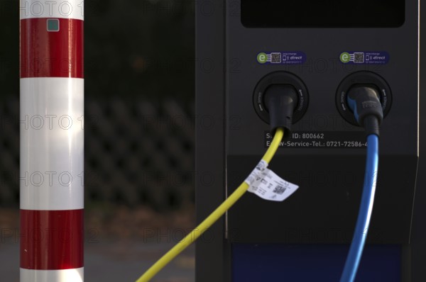 Detailed view, parking lot with gas pump, EnBW charging station for electric cars, charging
