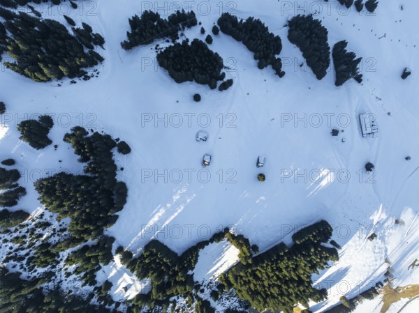 Top Down View, huts in a fantastic winter landscape, aerial view of the Wilder Kaiser ski area,