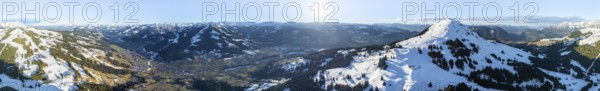 Alpine panorama, fantastic winter landscape with Hohe Salve, blue sky and snow, mountains and