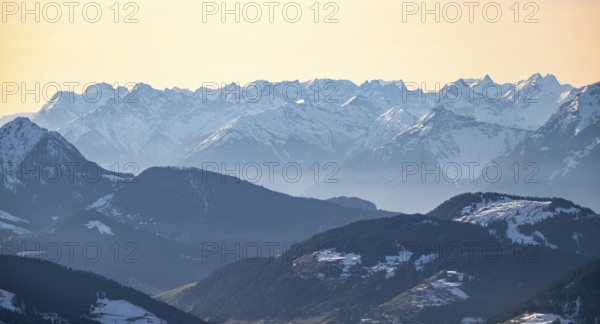 Mountain panorama with peaks of the Karwendel Mountains in winter in evening light, view from the