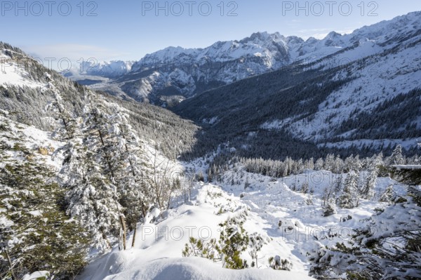 View over snow-covered side valley towards Reintal, snowy mountain landscape, ascent to