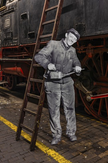 Replica of a railroad mechanic in work clothes with oil can, railway museum, Augsburg railway park,