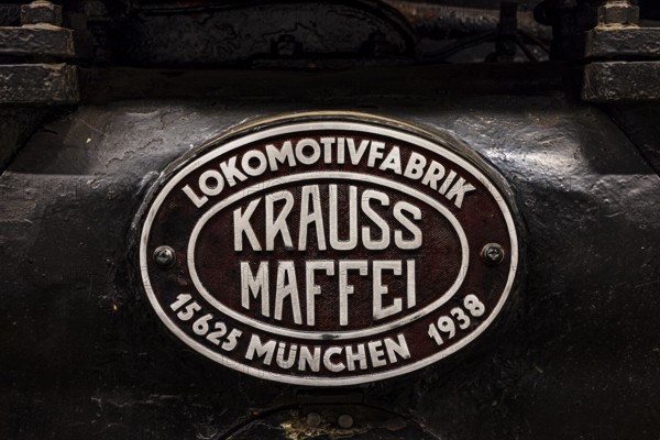 Name plate of the former locomotive factory, Kraus Maffei from Munich on a historic locomotive with