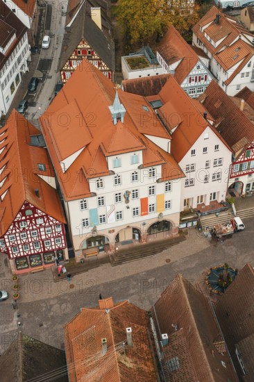 Historic half-timbered houses in an old town with red roofs and an autumn atmosphere, Calw, Black