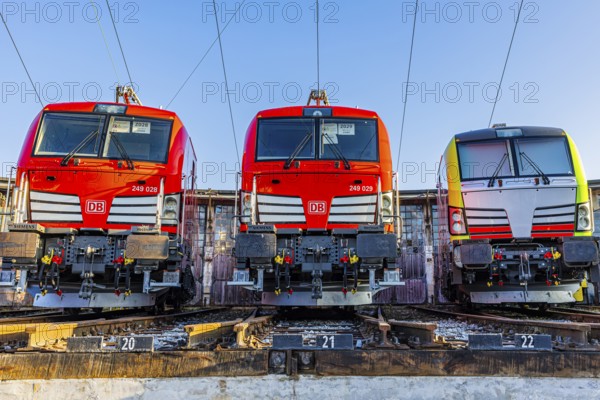 Modern locomotives of the Austrian Federal Railways, ÖBB, and Deutsche Bahn, DB, parked in front of