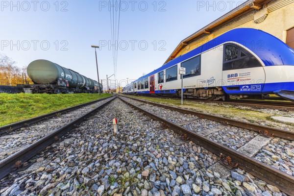 Modern Bavarian Regional Railway train, BRB, boiler wagons, parked in front of Augsburg railway