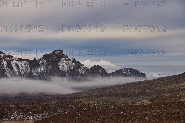 Rocks and mountain landscape with low-hanging clouds, UNESCO World Heritage Site, Teide National
