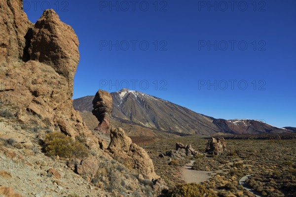 Rock formations in a dry volcanic landscape under clear sky, UNESCO World Heritage Site, Teide