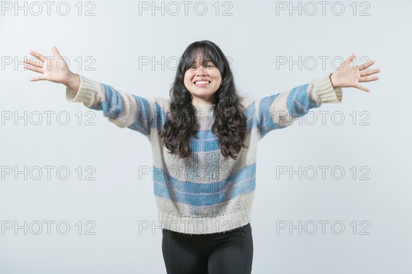 Beautiful asian woman welcoming you with open arms. Friendly asian girl welcoming with open arms