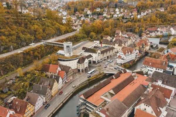 Aerial view of an urban environment with tower, roads and autumn landscape, Hermann Hessebahn, ZOB