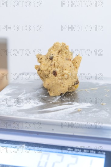 Dough with raisins on a scale in a baking environment, Christmas baking, Haselstaller Hof,