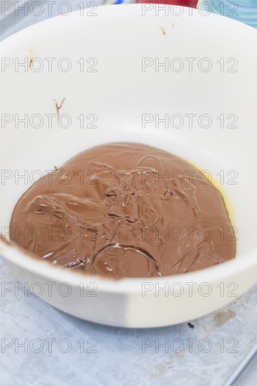 A white bowl of melted chocolate in the kitchen, Christmas baking, Haselstaller Hof, Wildberg,