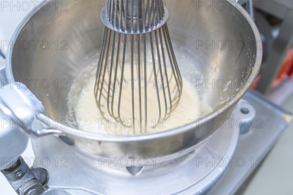 A metal mixing machine processes a light dough, Christmas baking, Haselstaller Hof, Wildberg,