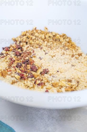 Nuts and berries are well mixed in a white bowl, Weihnachtsbacken, Haselstaller Hof, Wildberg,