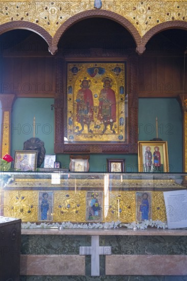 A richly decorated shrine with icons and gold ornaments, religious representations, Motsameta