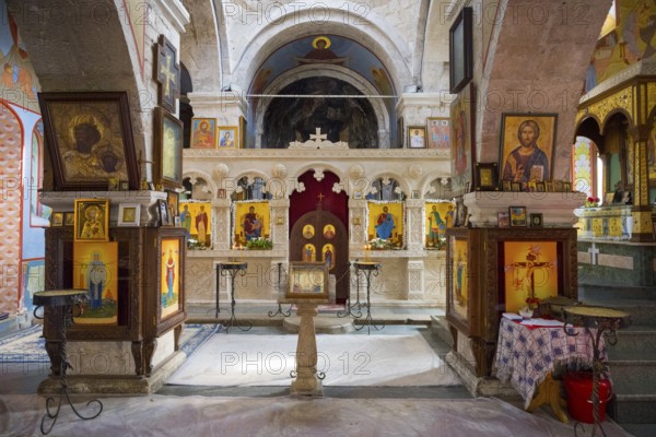 Interior of a church with altar and icons, richly decorated and religious atmosphere, Motsameta