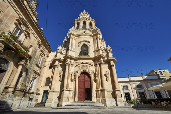 Ragusa, Baroque church with imposing façade against clear blue sky in Sicily, Baroque towns of