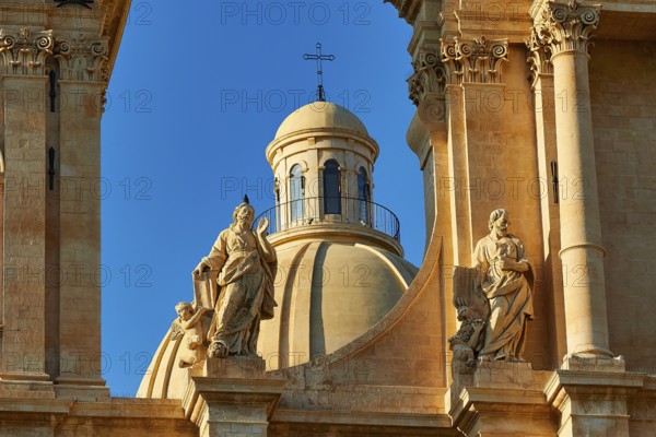 Noto, detailed view of a cathedral with elaborate statues and architecture, Baroque towns of