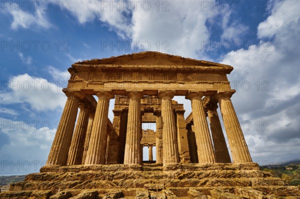 Temple of Concordia, imposing ancient temple with columns under a blue sky, Valley of the Temples,